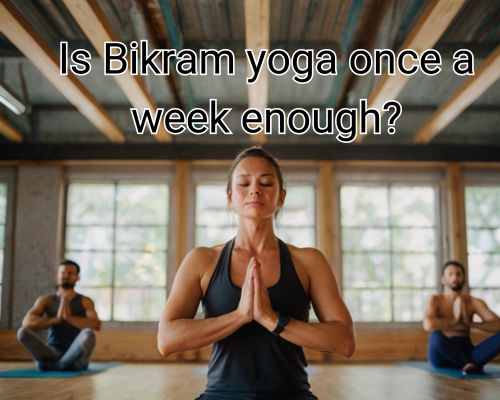 Yoga effort shows in woman’s sweat and smile.